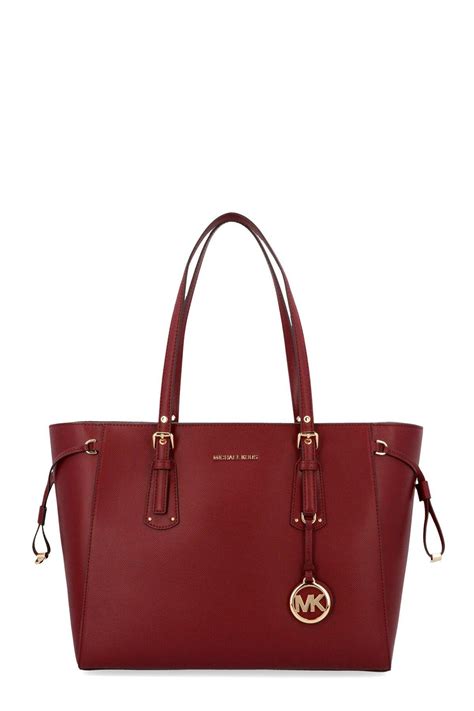 michael kors tote burgundy strap|Michael Kors purse straps fraying.